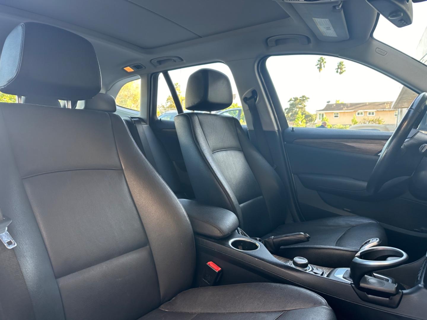 2014 WHITE /Black BMW X1 Leather (WBAVL1C56EV) with an 4 Cylinders engine, AUTOMATIC transmission, located at 30 S. Berkeley Avenue, Pasadena, CA, 91107, (626) 248-7567, 34.145447, -118.109398 - Don't let bad credit or financial setbacks hold you back from owning a luxury SUV like the 2014 BMW X1 xDrive28i. At our BHPH dealership, we're here to make the car-buying process as smooth and stress-free as possible. We invite you to visit our dealership in Pasadena, CA, to explore our inventory o - Photo#21